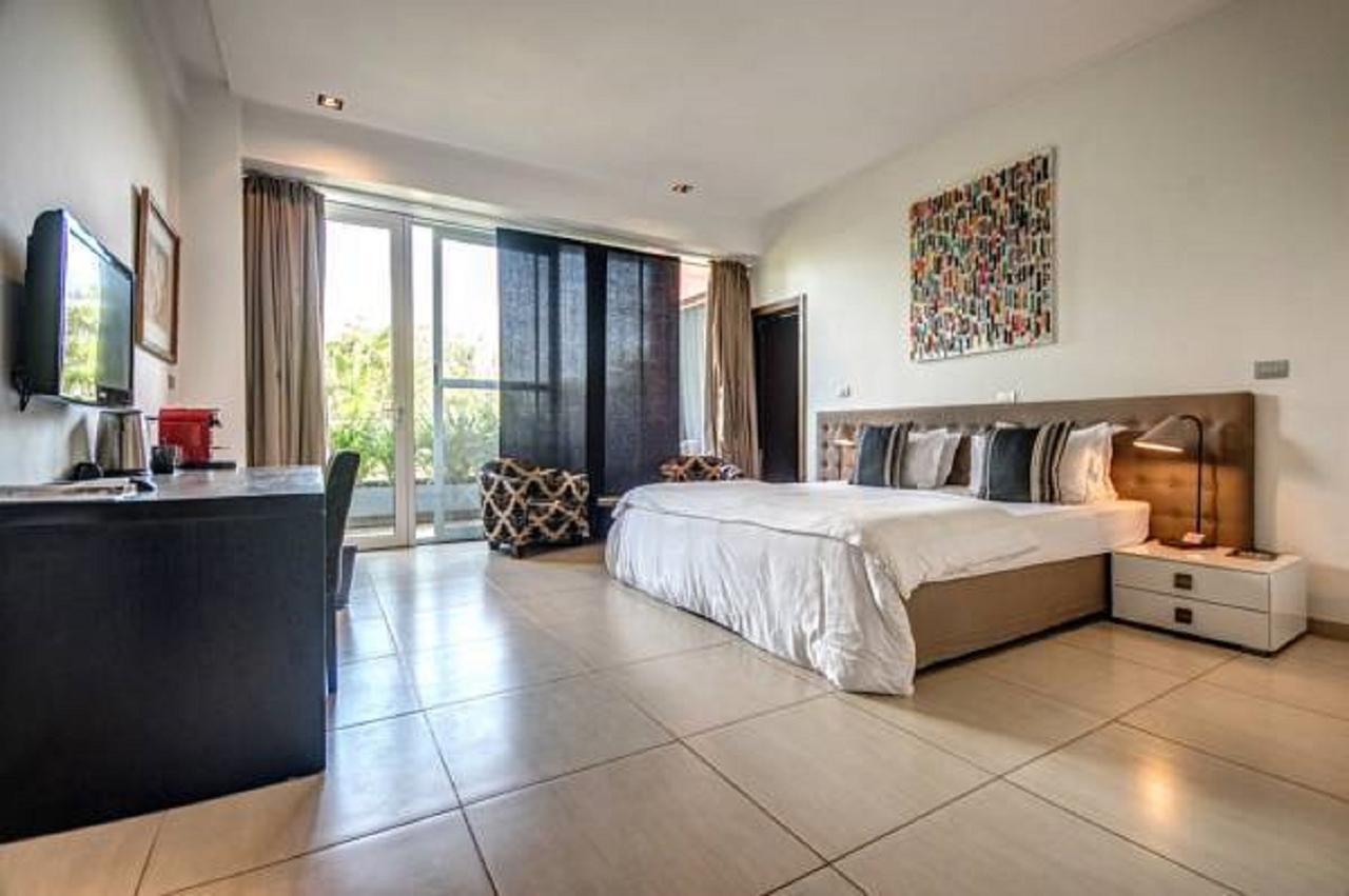 Hotel Maison Rouge Cotonou Buitenkant foto