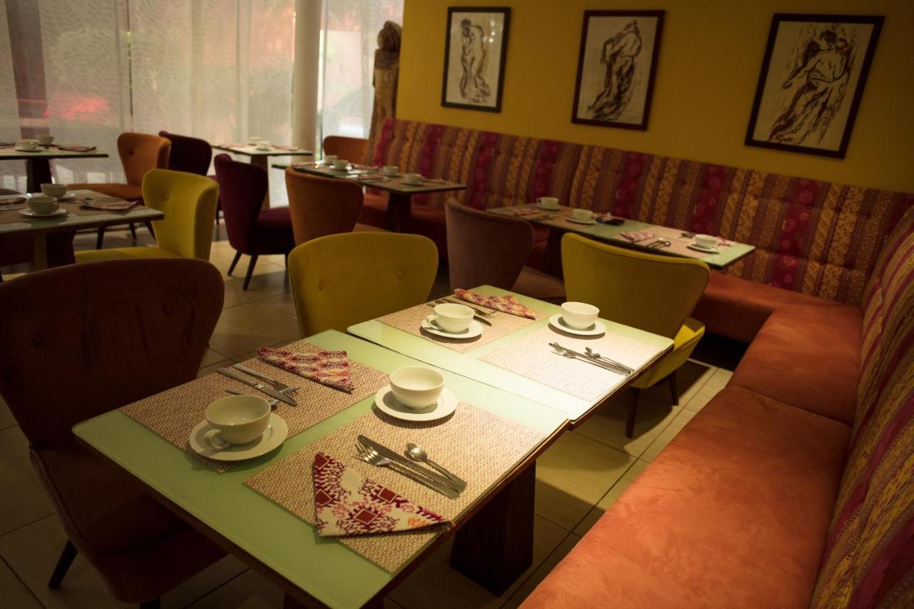 Hotel Maison Rouge Cotonou Buitenkant foto