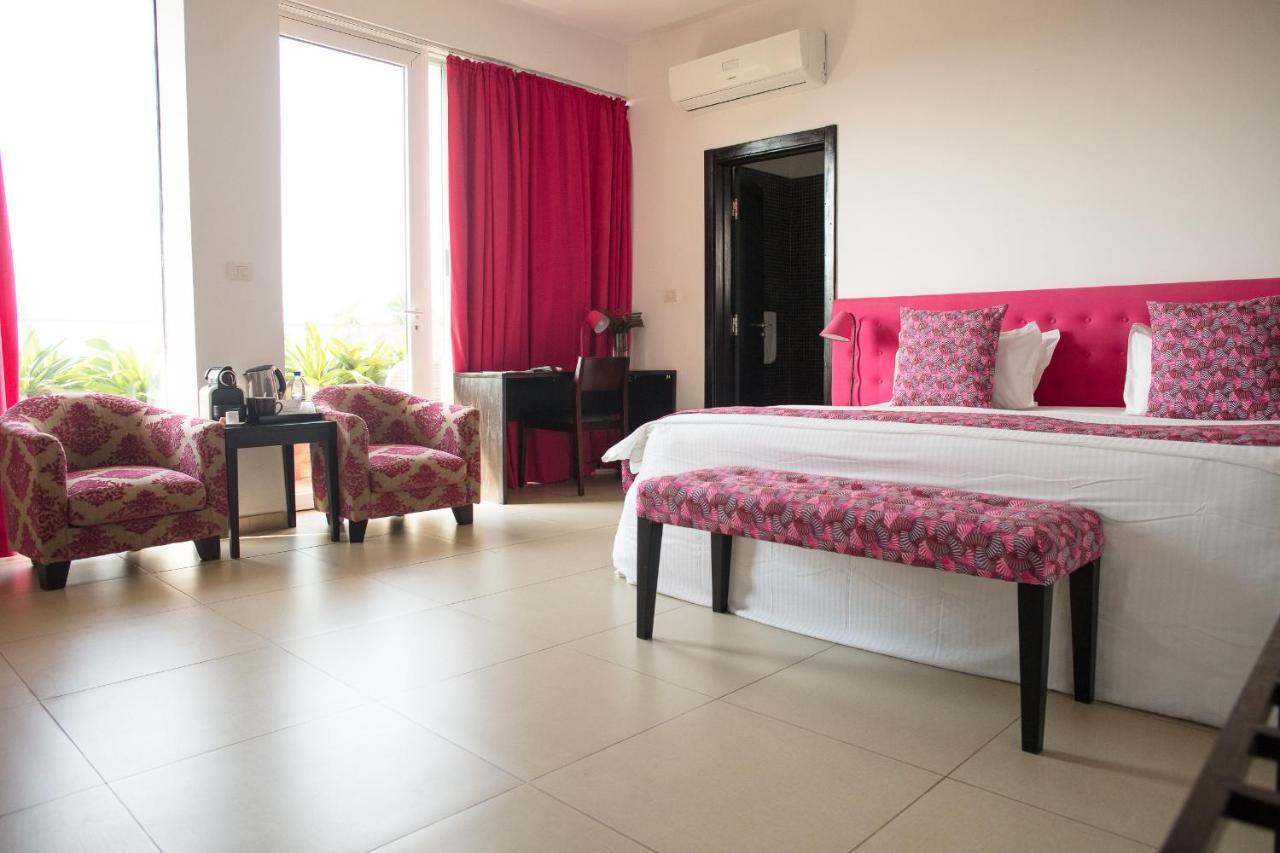 Hotel Maison Rouge Cotonou Buitenkant foto